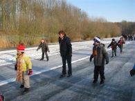 Scholen schaatsen ijsbaan